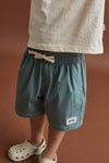 RHYTHM - Kids Contrast Beach Short Teal